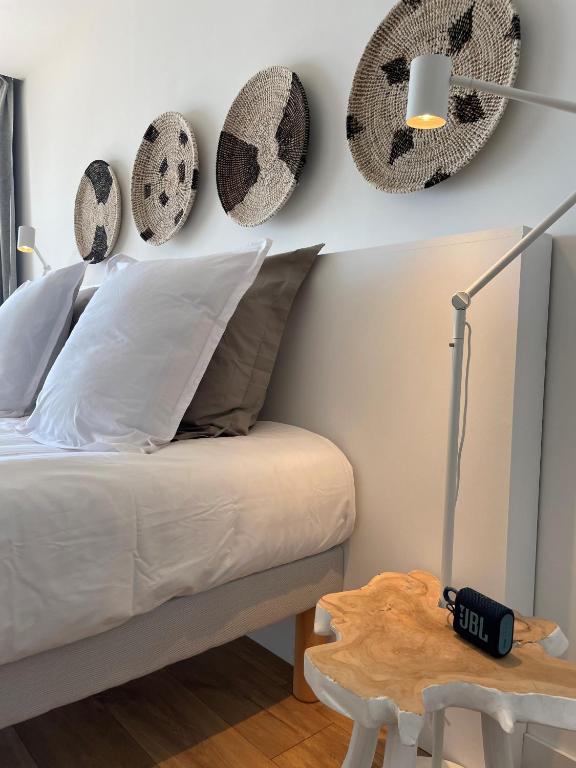 Postel nebo postele na pokoji v ubytování HDLT le Suit’Appart face mer