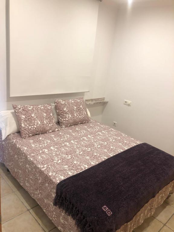 Łóżko lub łóżka w pokoju w obiekcie apartamento centrico silencioso
