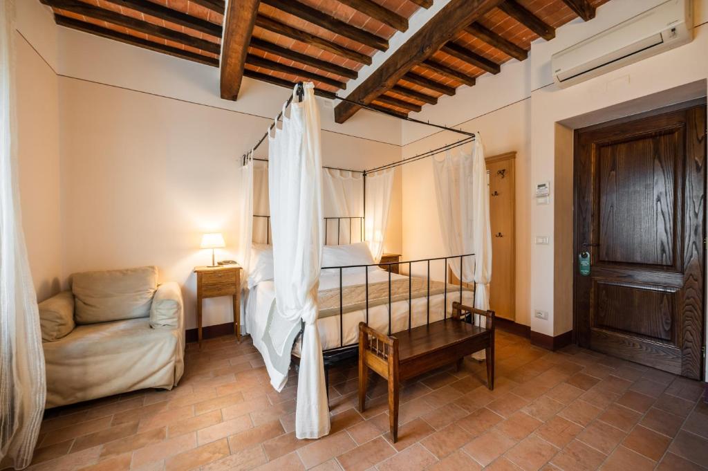 Postel nebo postele na pokoji v ubytování L'orto Delle Terme