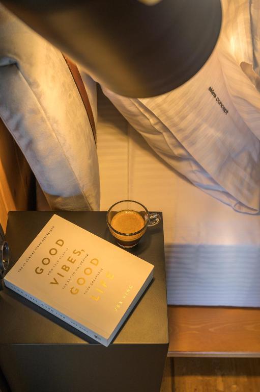A bed or beds in a room at Skins Concept Boutique Apartment