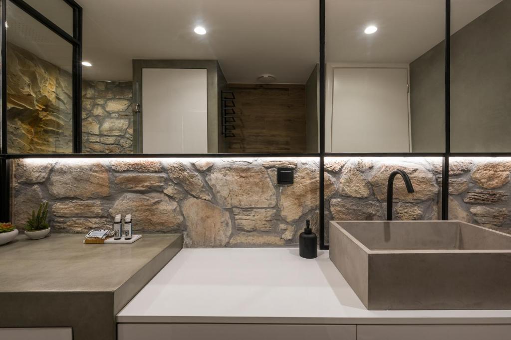 A bathroom at Skins Concept Boutique Apartment