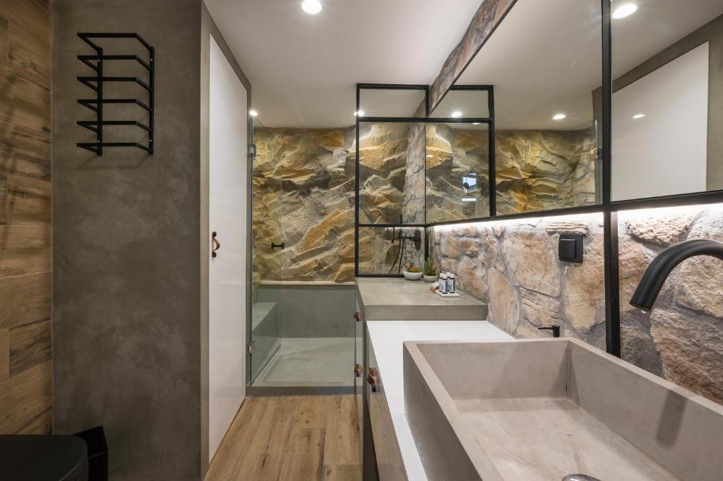 A bathroom at Skins Concept Boutique Apartment