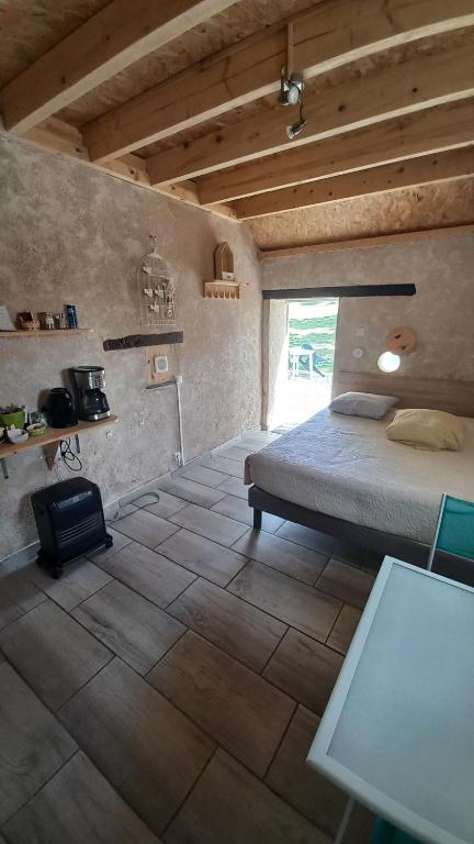 Postel nebo postele na pokoji v ubytování Le calme à la campagne