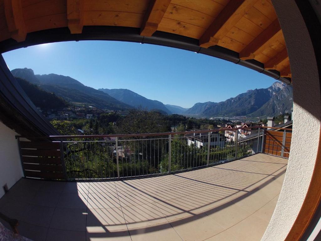 a balcony with a view of the mountains at B&B Aria d'Argento - Bike Tours in Trento