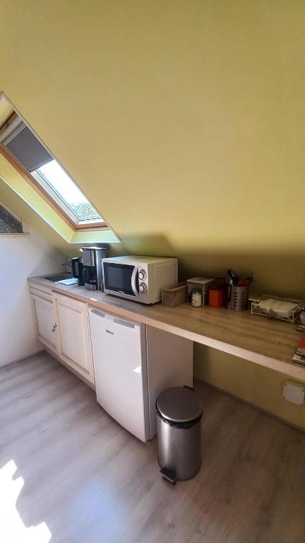 Kuchyň nebo kuchyňský kout v ubytování Le calme à la campagne
