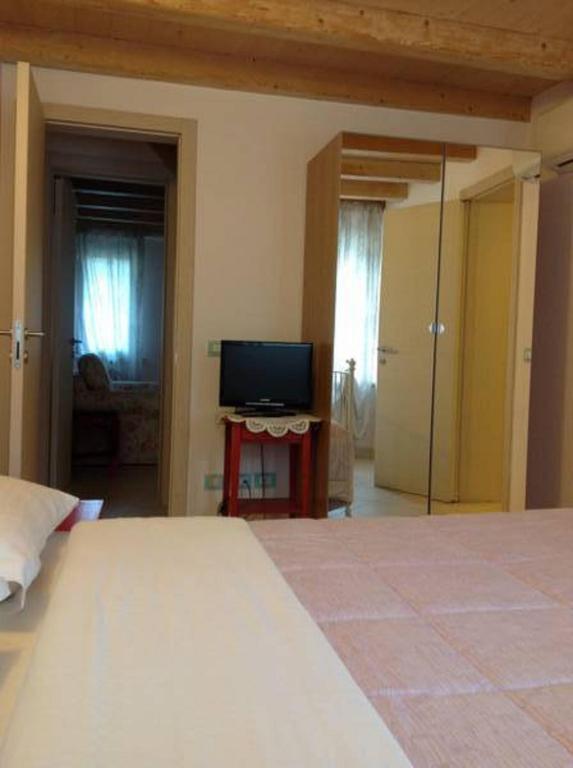 TV a/nebo společenská místnost v ubytování B&B La Pitagora