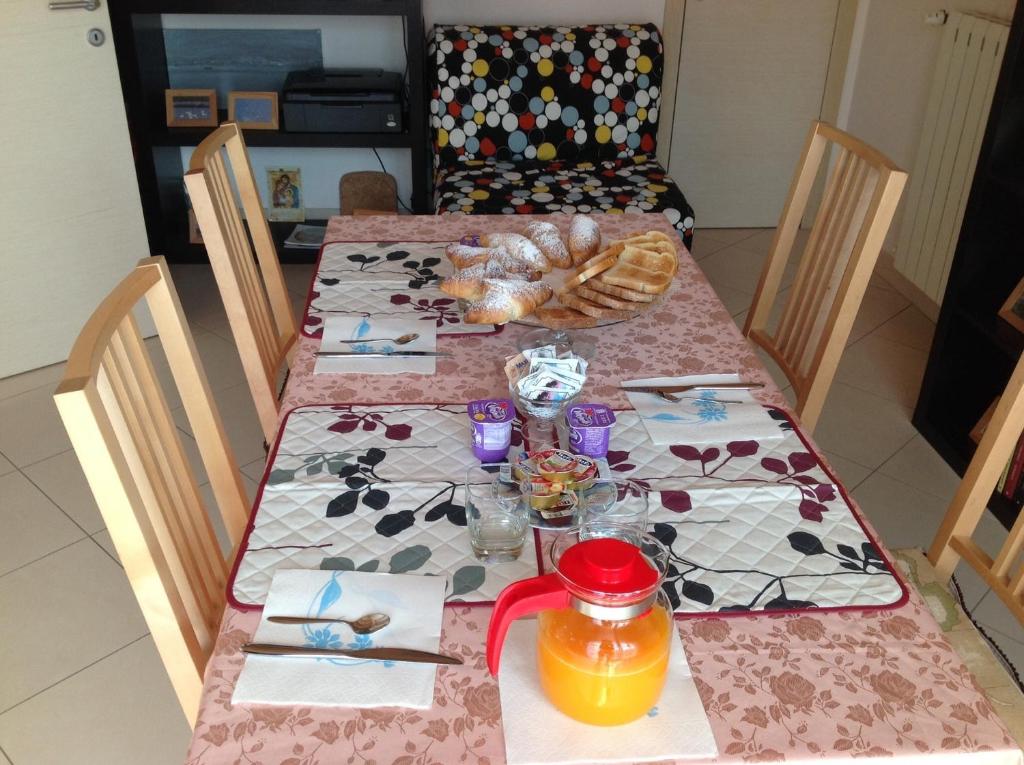 Postel nebo postele na pokoji v ubytování B&B La Pitagora