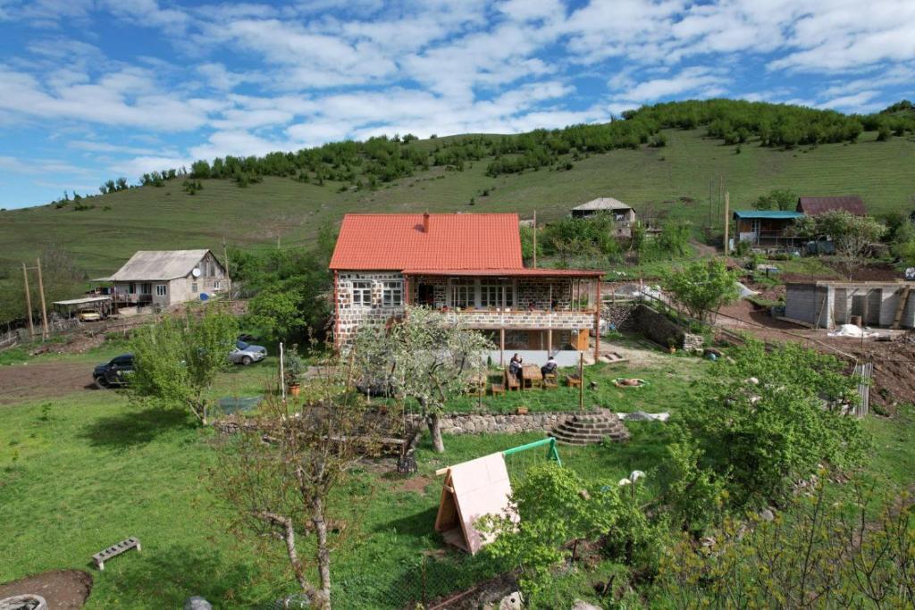 an aerial view of a house in a field at Chamich Guesthouse in Debed