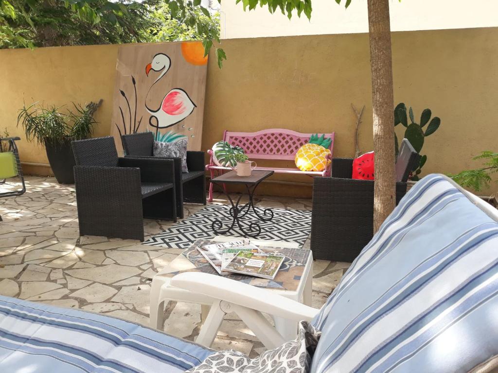 Posezení v ubytování Villa 3 étoiles près des plages, Parking, Wifi, Clim