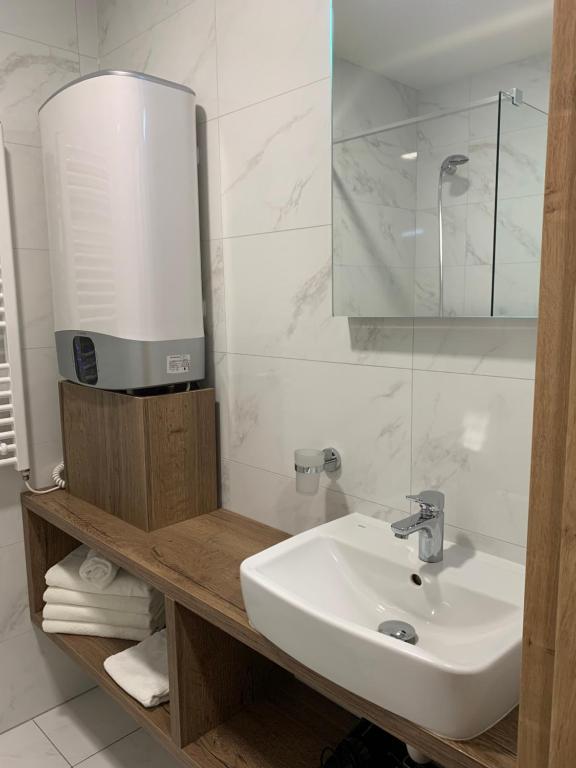 Koupelna v ubytování Apartmány Valča