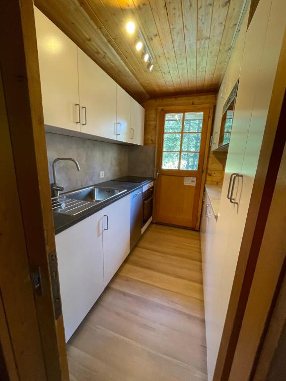 Kuchyň nebo kuchyňský kout v ubytování Chalet Singlinaz