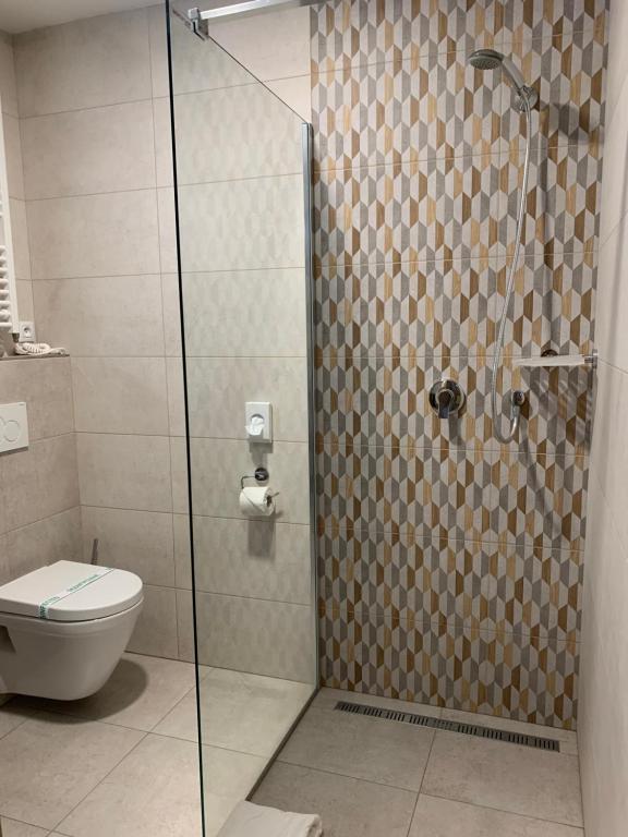 Koupelna v ubytování Apartmány Valča