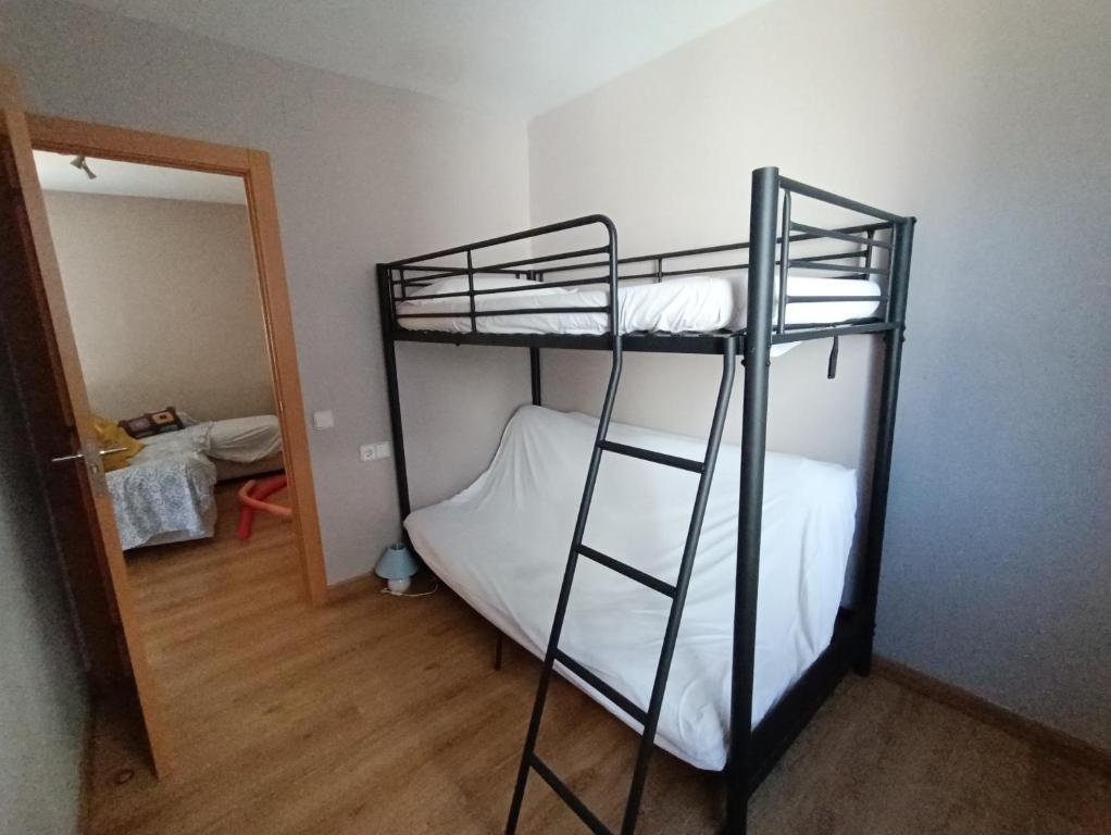 Postel nebo postele na pokoji v ubytování Palfuriana 86, a 30 metros de la playa WIFI ideal con niños (12)
