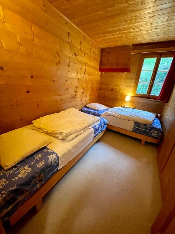 Postel nebo postele na pokoji v ubytování Chalet Singlinaz