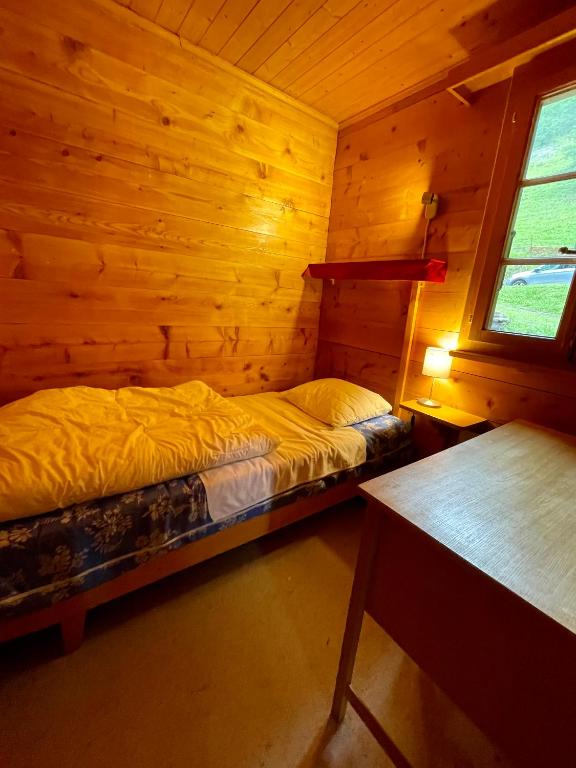 Postel nebo postele na pokoji v ubytování Chalet Singlinaz