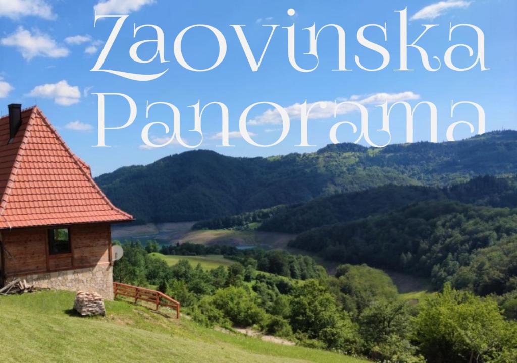 a picture of a house on a hill with the text kawasaki panorama at Zaovinska Panorama I in Bajina Bašta
