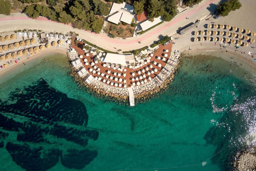 an aerial view of a resort with a pool of water at Radisson Blu Resort & Spa in Split