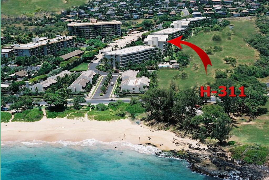 an aerial view of a resort near the beach at Maui Banyan H311 1BD 2BA 3 min walk to the beach in the Heart of South Kihei! in Wailea