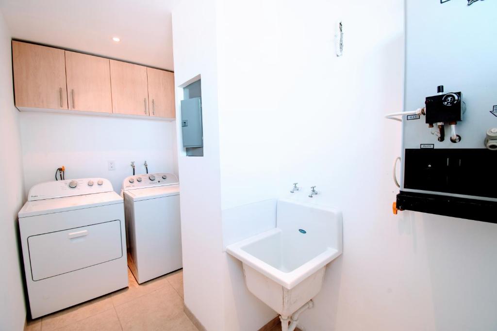 Kuchyň nebo kuchyňský kout v ubytování Terra Residencial