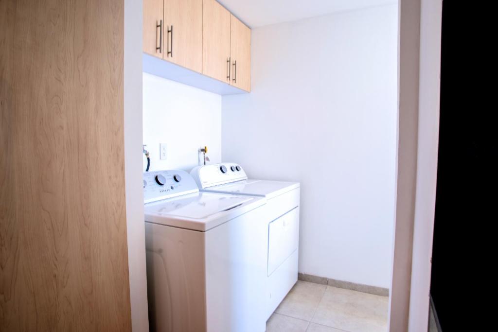Kuchyň nebo kuchyňský kout v ubytování Terra Residencial