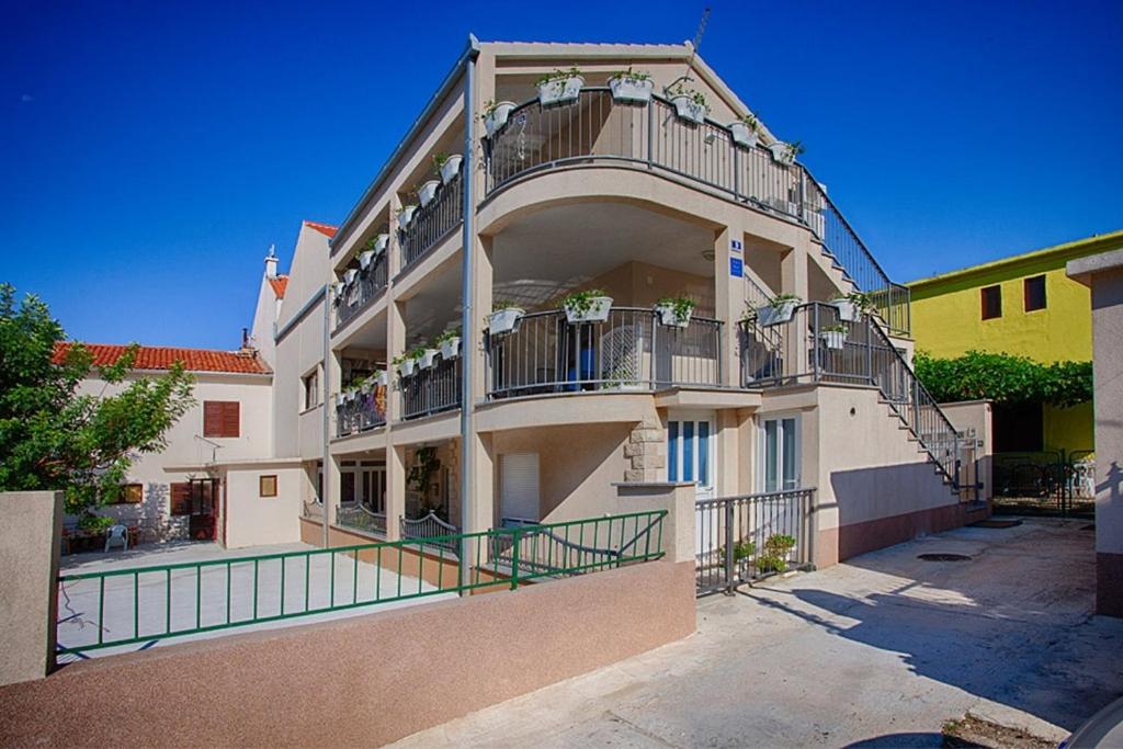 Fotografia z galérie ubytovania Apartments with a parking space Komiza, Vis - 12325 v destinácii Komiža