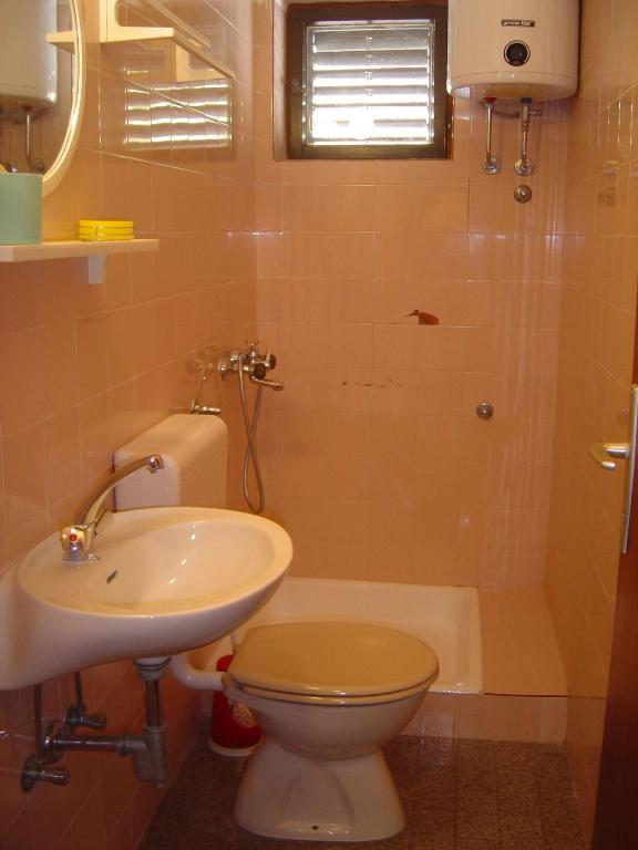 Fotografia z galérie ubytovania Apartments by the sea Podgora, Makarska - 12465 v Podgore
