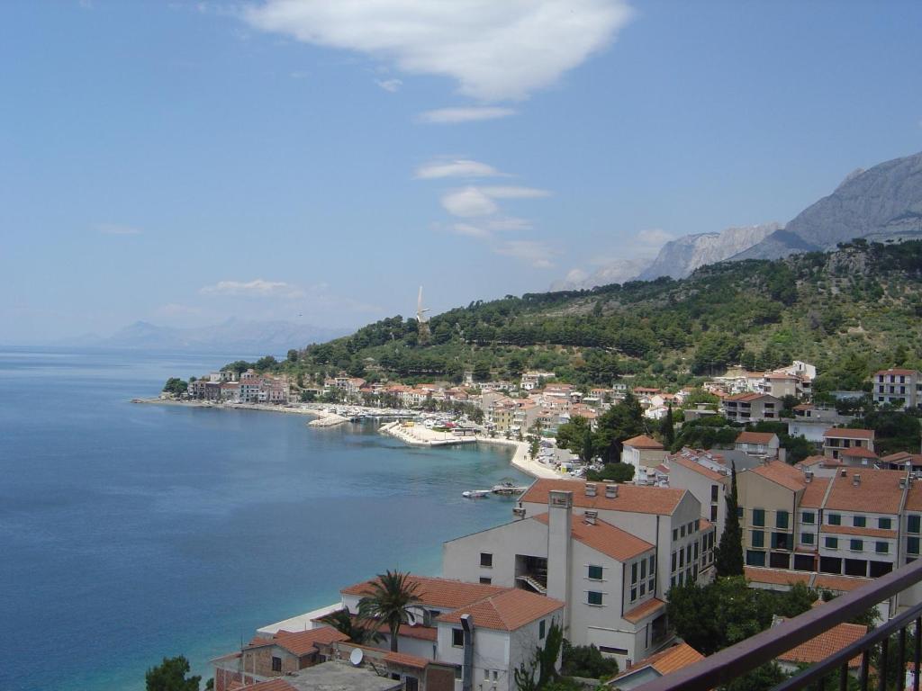 Fotografia z galérie ubytovania Apartments by the sea Podgora, Makarska - 12465 v Podgore