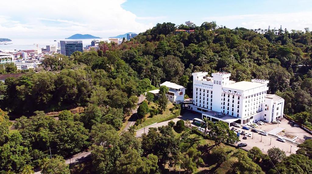 an overhead view of a large white building on a hill at The Palace Hotel Kota Kinabalu in Kota Kinabalu