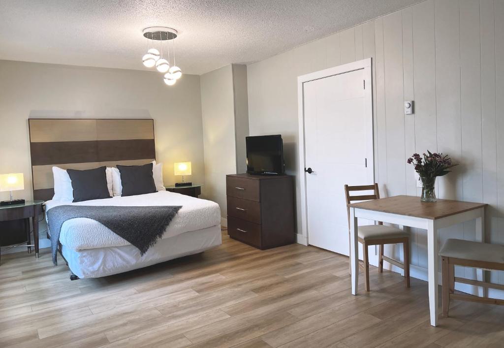 Postel nebo postele na pokoji v ubytování Oceanside Villas