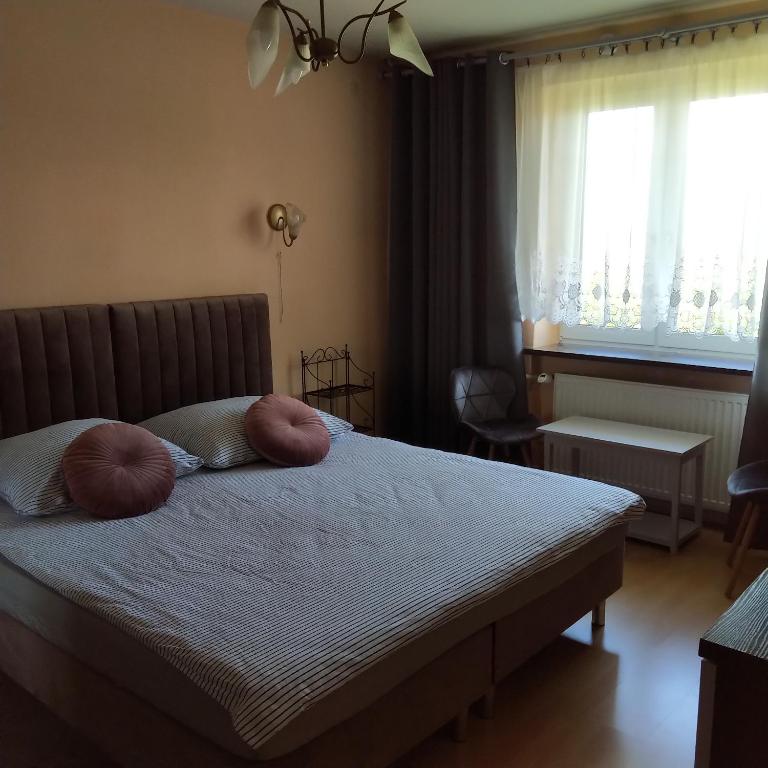 Łóżko lub łóżka w pokoju w obiekcie Willa Gorzow-spokojna okolica!