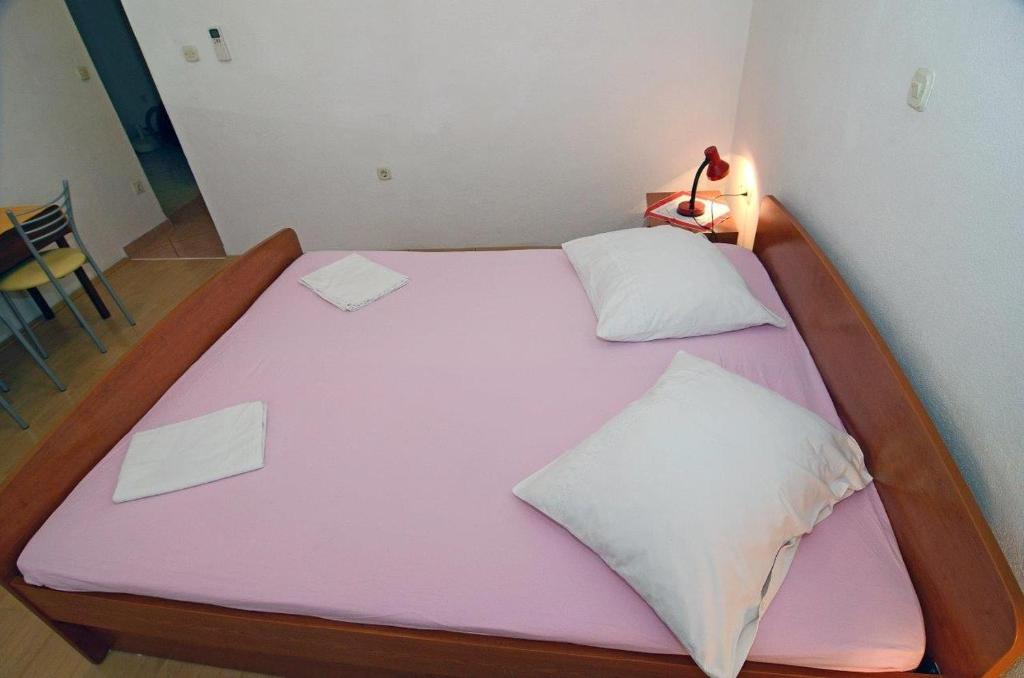 Posteľ alebo postele v izbe v ubytovaní Studio Makarska 12211b