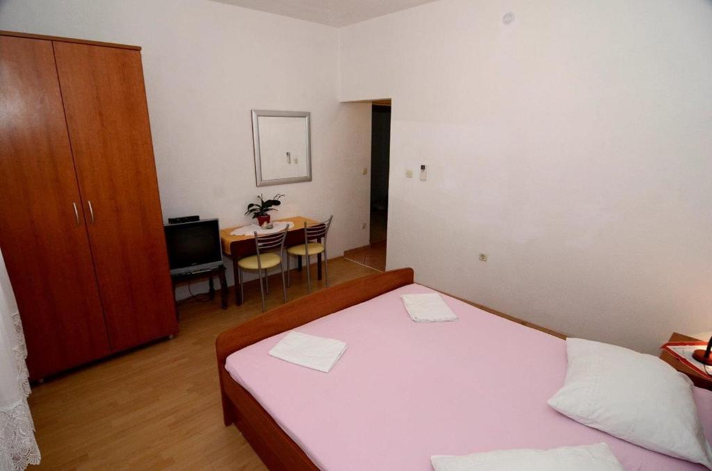 Posteľ alebo postele v izbe v ubytovaní Studio Makarska 12211b