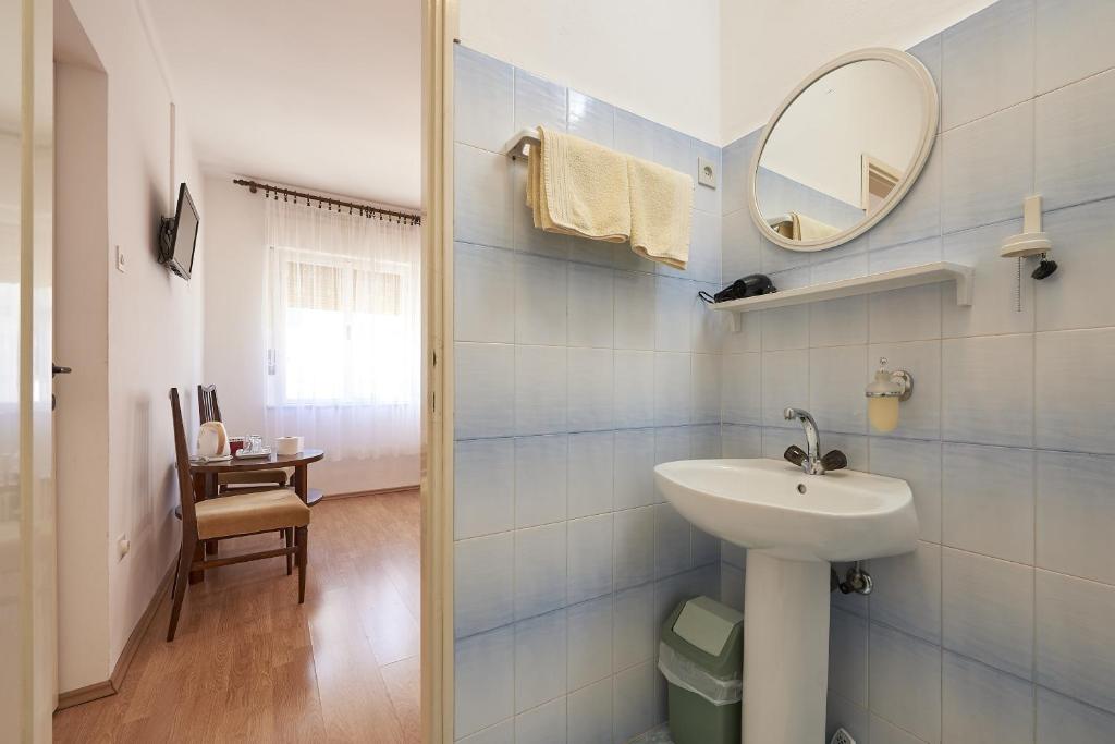 Koupelna v ubytování Apartments and rooms with parking space Trogir - 13102