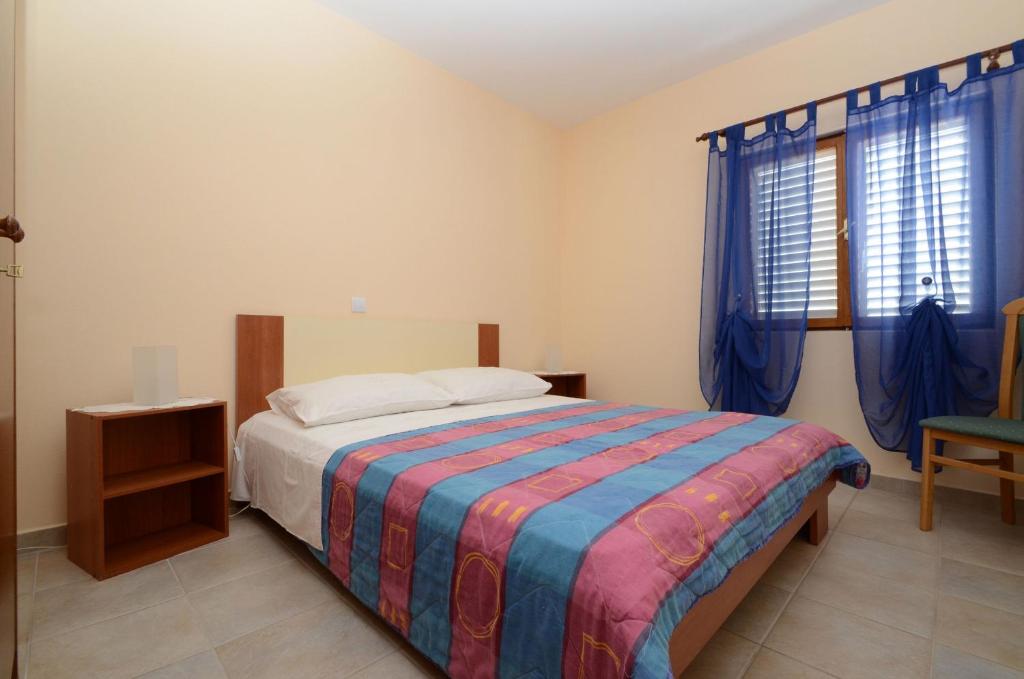 Postel nebo postele na pokoji v ubytování Apartments by the sea Karbuni, Korcula - 13217