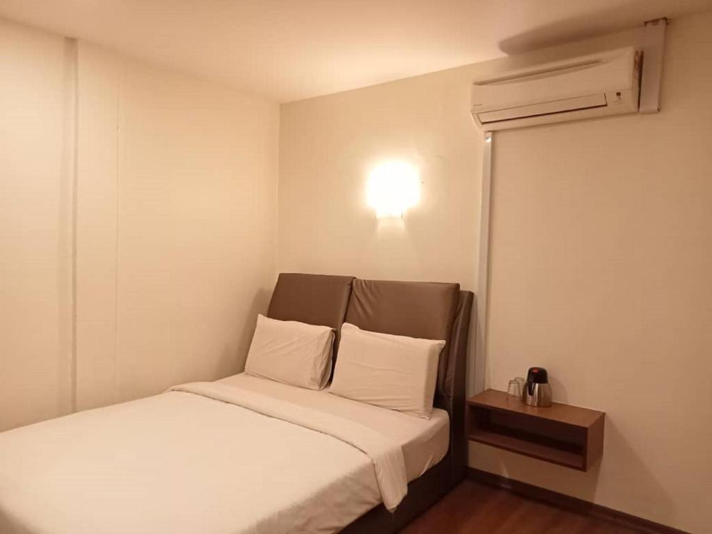 Postel nebo postele na pokoji v ubytování I Harmony Hotel