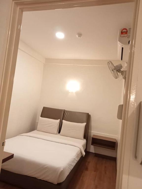 Postel nebo postele na pokoji v ubytování I Harmony Hotel