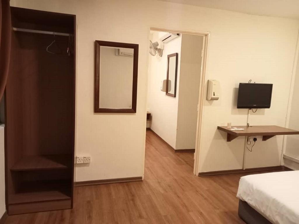 TV a/nebo společenská místnost v ubytování I Harmony Hotel