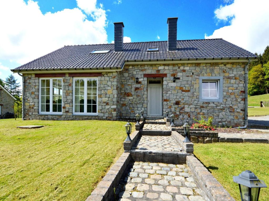Holiday home Detached natural stone house with sunny garden and terrace,  modern interior, Trou de Bra, Belgium - Booking.com