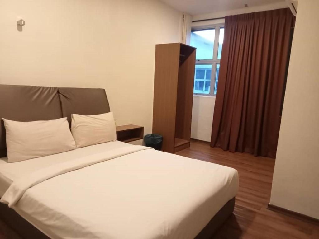 Postel nebo postele na pokoji v ubytování I Harmony Hotel