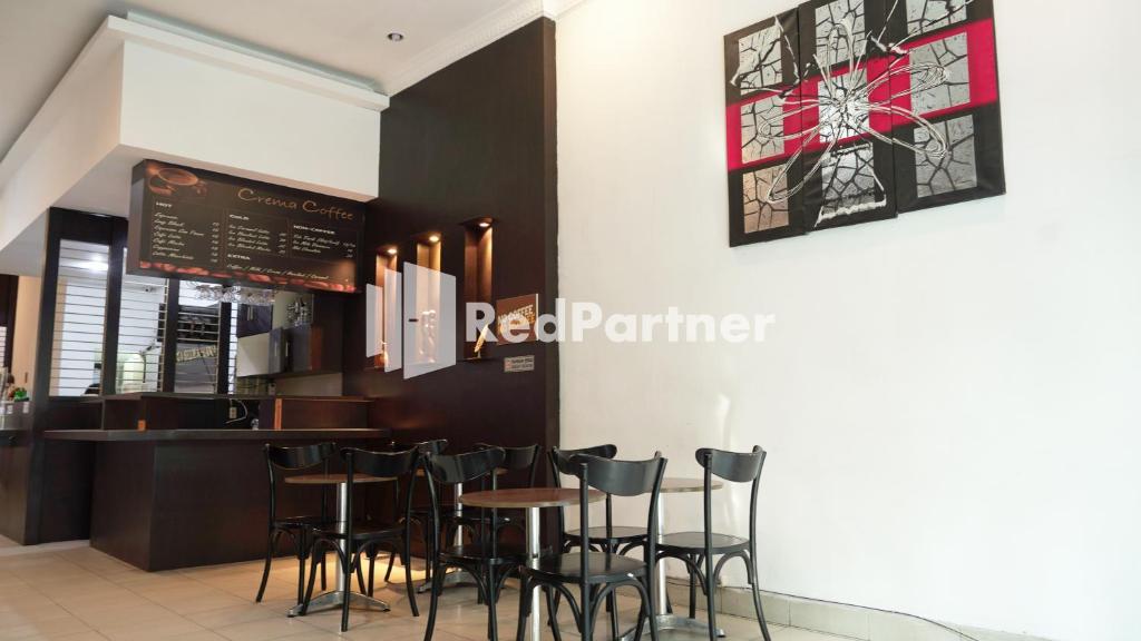 Fotografie z fotogalerie ubytování Wisma Sederhana Medan Mitra RedDoorz v destinaci Medan