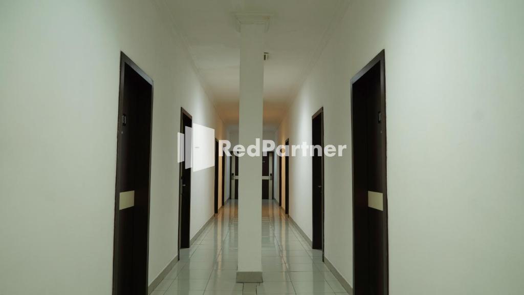 Fotografie z fotogalerie ubytování Wisma Sederhana Medan Mitra RedDoorz v destinaci Medan