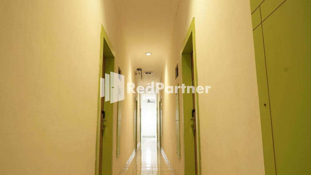Fotografie z fotogalerie ubytování Wisma Sederhana Medan Mitra RedDoorz v destinaci Medan