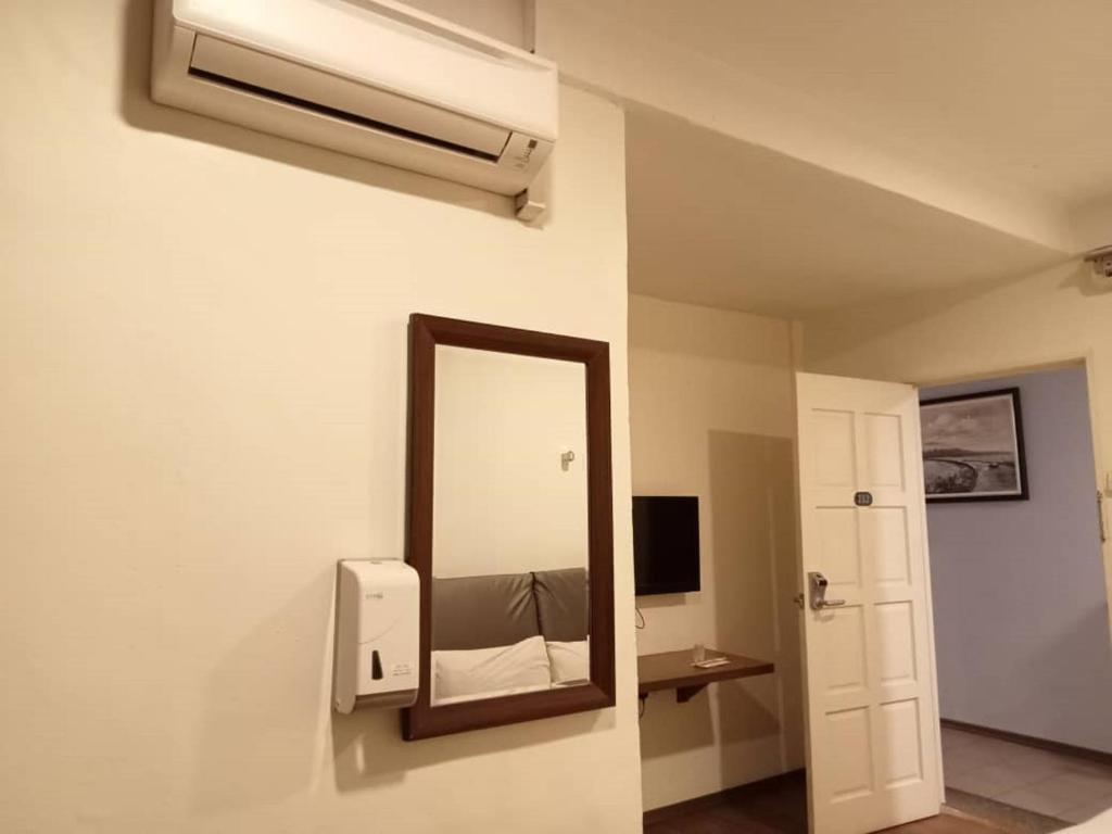 TV a/nebo společenská místnost v ubytování I Harmony Hotel