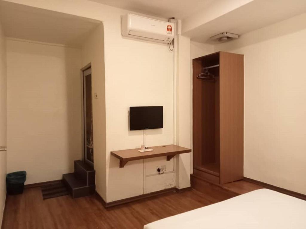 TV a/nebo společenská místnost v ubytování I Harmony Hotel