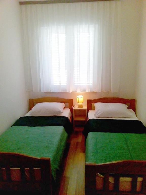 Zdjęcie z galerii obiektu Apartment Mandre 12409c w mieście Kolan