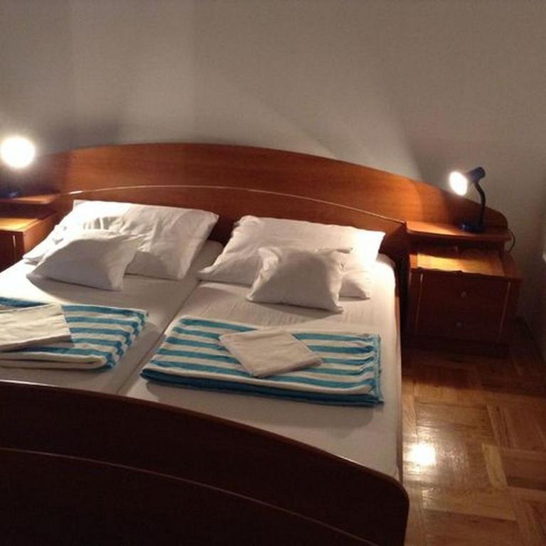 Posteľ alebo postele v izbe v ubytovaní Apartments with a parking space Novigrad - 12572