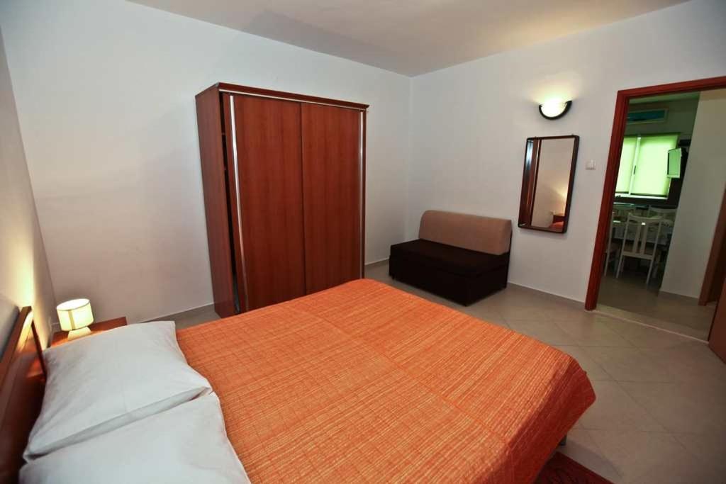 Posteľ alebo postele v izbe v ubytovaní Apartment Pakostane 14658a