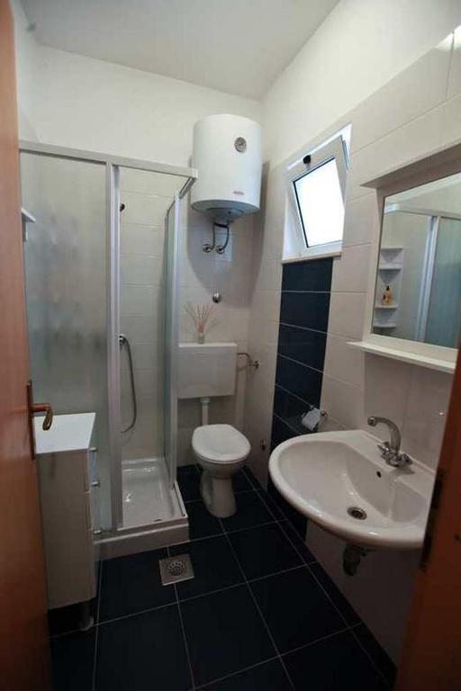 Kúpeľňa v ubytovaní Apartment Pakostane 14658a