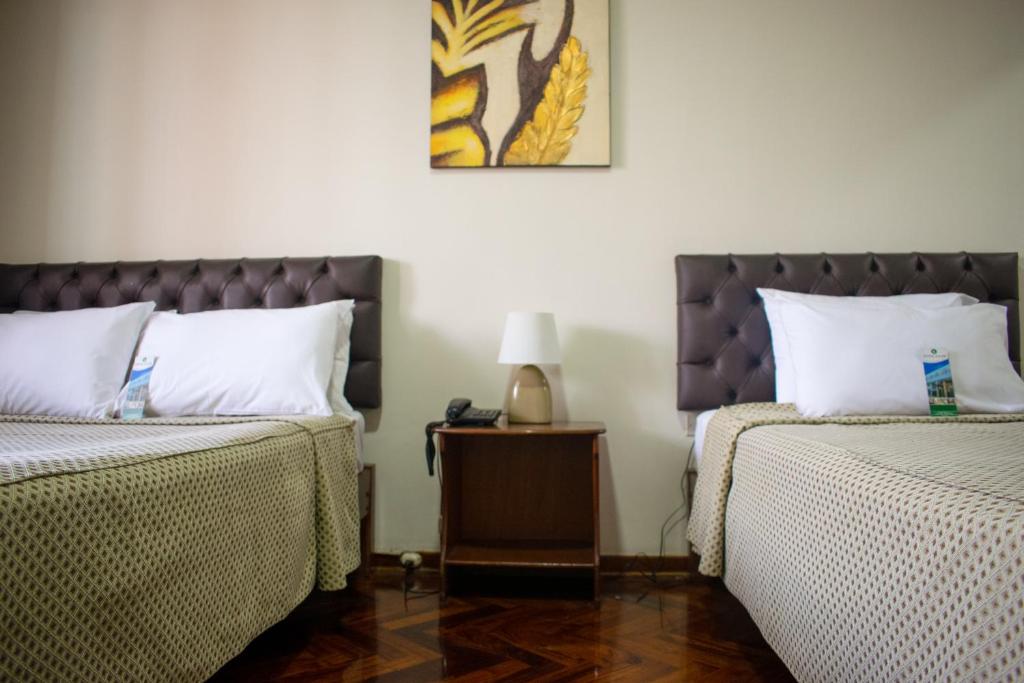 Postel nebo postele na pokoji v ubytování Hostal Solari