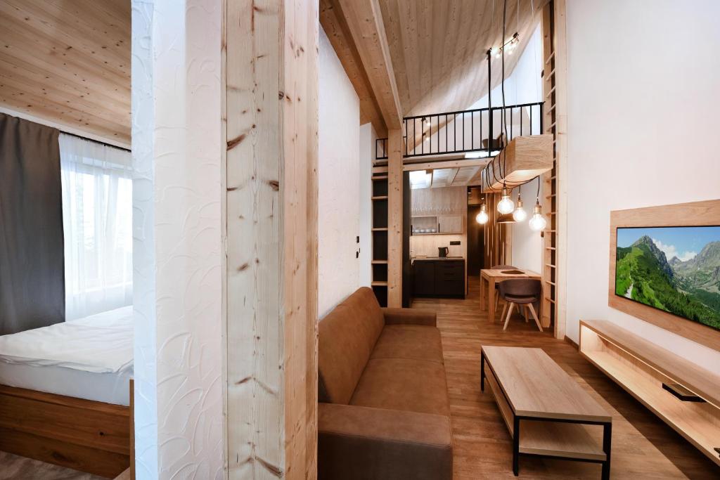 Postel nebo postele na pokoji v ubytování APLEND Hotel Ovruč